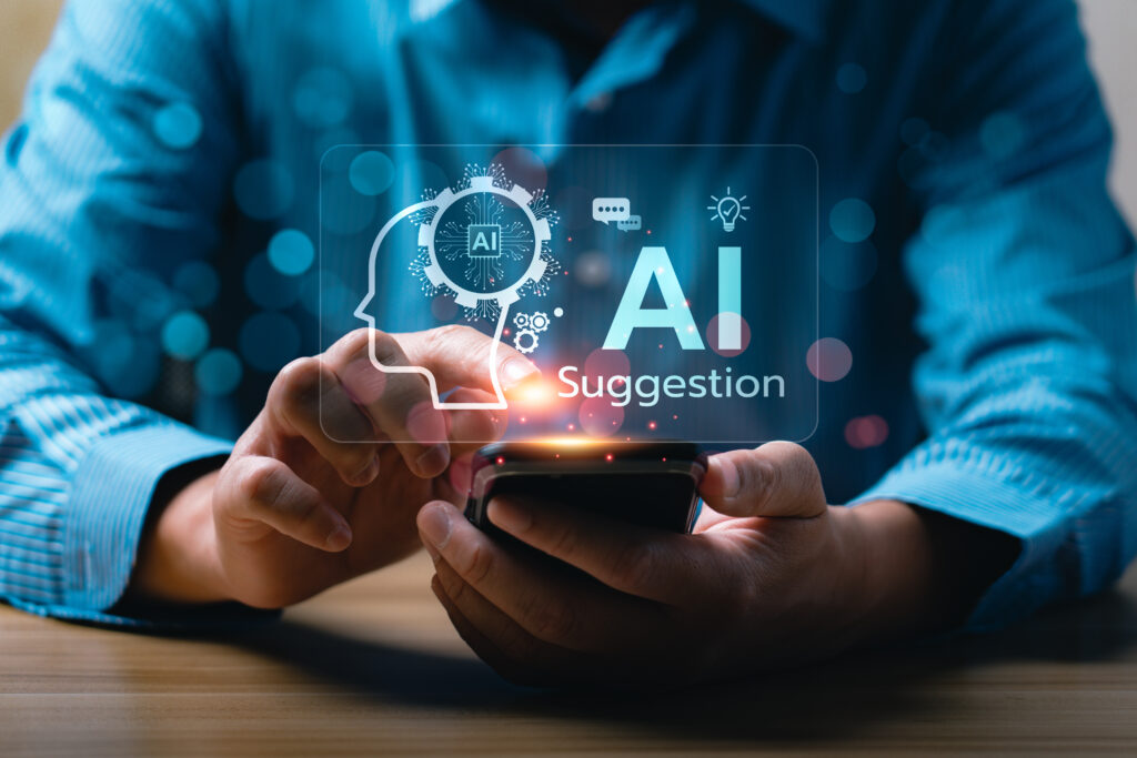 Close up hand using smartphone with hologram interface showing AI suggestion system, symbolizing artificial intelligence, recommendation algorithm, and personalized smart technology in digital age.